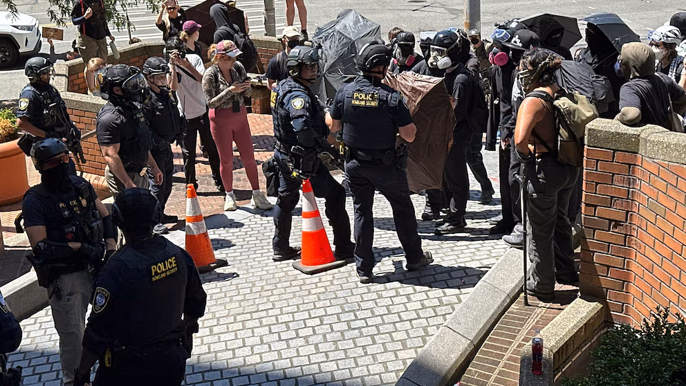 Protests over immigration raids pop up across the US with more planned